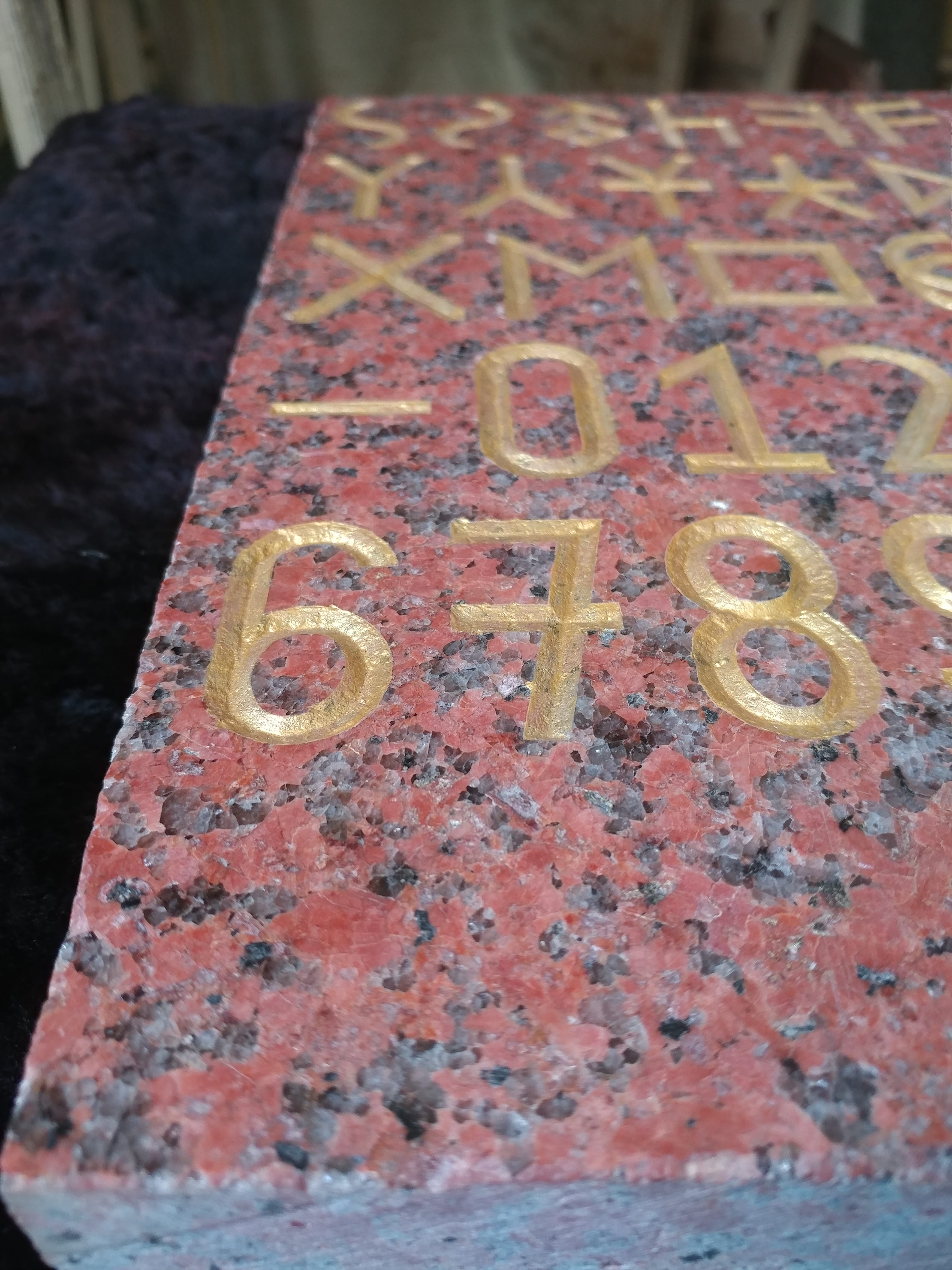 Red stone gold close.