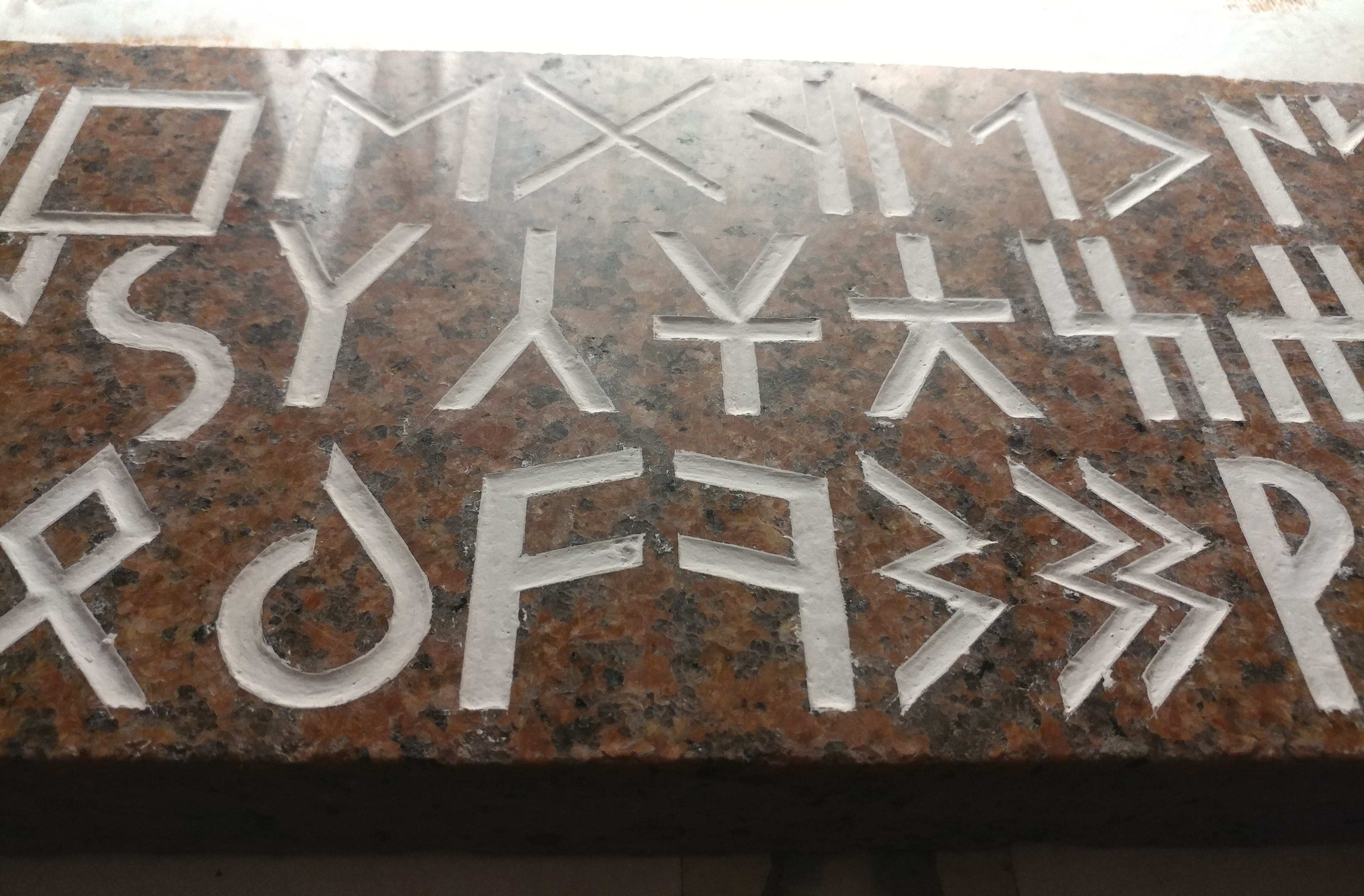 Red stone carving close.